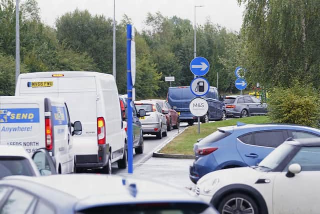 Cars refueling at a BP service station in Wetherby near Leeds. Picture date: Monday September 27, 2021. Photo: Danny Lawson/PA.