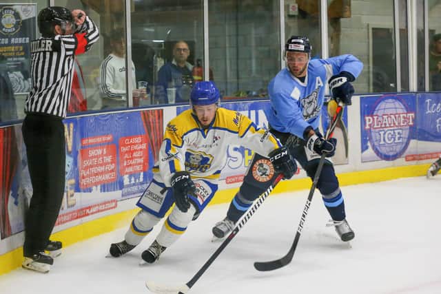 GAME ONE: Leeds Knights' Lewis Houston battles with Sheffield Steeldogs' Ben Morgan at Elland Road - you can be there this Sunday to see the Knights take on Raiders IHC Picture: Andy Bourke/Podium Prints