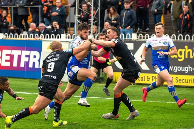 Tom Briscoe scores for Rhinos in this season's win at Castleford. Picture by Bruce Rollinson.