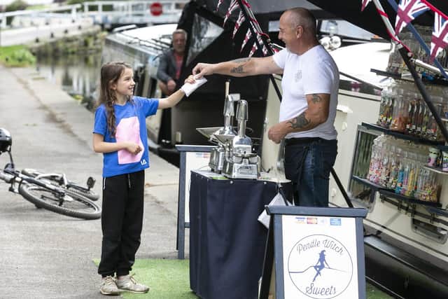 Pat and Jill Creaven opened their floating sweet shop during lockdown and float up and down the Leeds-Liverpool canal. Picture: Lee McLean/SWNS