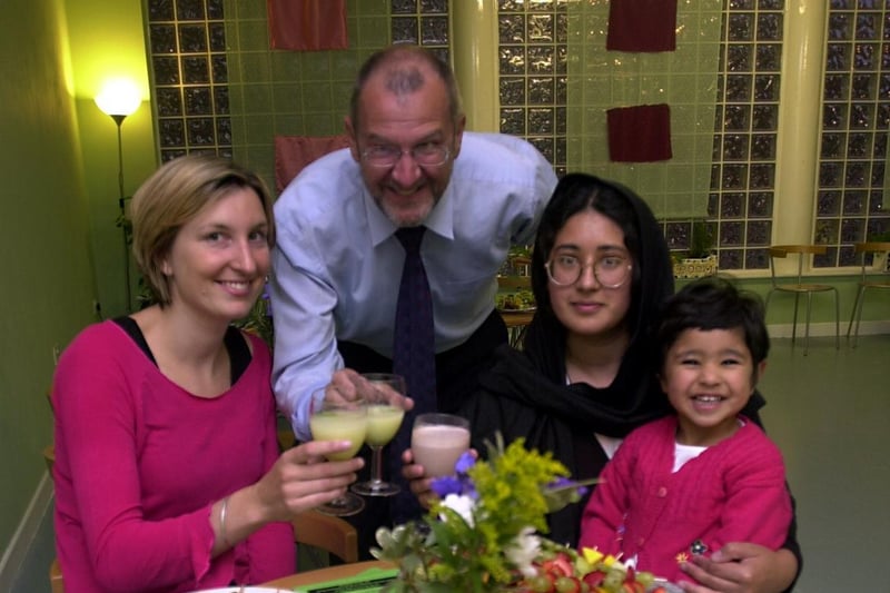The Burley Lodge Centre Community Cafe opened in Leeds. John Battle MP joins volunteer co-ordinator Anna Middlemiss (left) and Mumtaz Hussain with daughter Mugheesah.