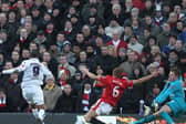 Jermaine Beckford scores at Old Trafford. Pic: Alex Livesey/Getty.