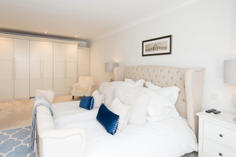 The master bedroom suite has a stunning dressing room and en suite.