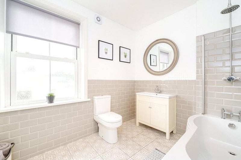 On this floor is the chic house bathroom, again designed by the current owners in calming, neutral tones.