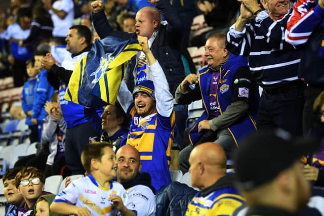 Leeds Rhinos fans celebrate their victory at Wigan last week.

 Picture: Jonathan Gawthorpe.