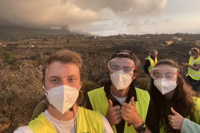 Ben Ireland, left, and fellow interns of GeoTenerife with front row seats to the erupting Cumbre Viejo.
