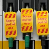 Fuel pumps are marked "Sorry out of use" as a Shell petrol statio in Northwich  waits for a delivery on September 27, 2021.

Photo by Christopher Furlong/Getty Images
