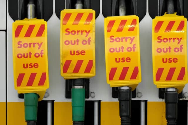 Fuel pumps are marked "Sorry out of use" as a Shell petrol statio in Northwich  waits for a delivery on September 27, 2021.

Photo by Christopher Furlong/Getty Images