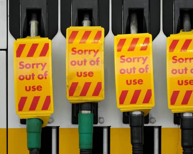 Fuel pumps are marked "Sorry out of use" as a Shell petrol statio in Northwich  waits for a delivery on September 27, 2021.

Photo by Christopher Furlong/Getty Images