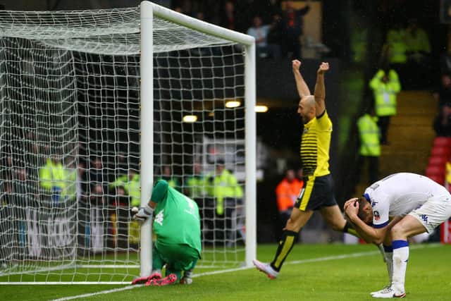 Scott Wootton reacts to his own goal at Vicarage Road. Pic: Richard Heathcote/Getty