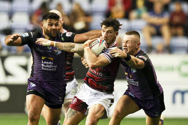 Leeds Rhinos’ Rhyse Martin, left, would love to see tonight’s Super League semi-final at St Helens turn into a grinding battle – much like last week’s game at Wigan. Picture: Paul Currie/SWpix.com.