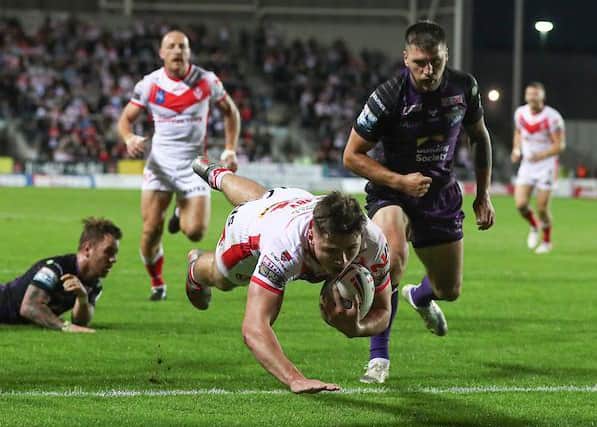 Jack Welsby scores during Saints' big win over Leeds last month, but coach Kristian Woolf expects Friday's game to be much closer. Picture by Paul Currie/SWpix.com.