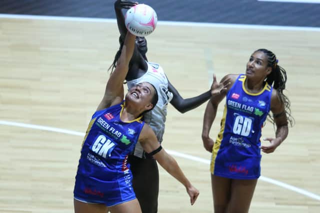Leeds Rhinos' Tuaine Keenan, left, battles with Mary Cholhok of Loughborough Lightning during the Vitality Netball Superleague semi-final in June. Picture: Morgan Harlow/Getty Images.