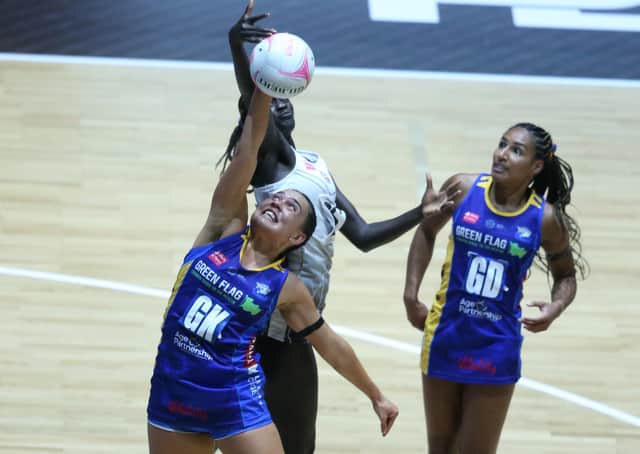 Leeds Rhinos' Tuaine Keenan, left, battles with Mary Cholhok of Loughborough Lightning during the Vitality Netball Superleague semi-final in June. Picture: Morgan Harlow/Getty Images.
