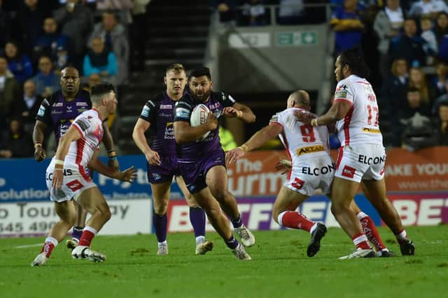 Rhyse Martin takes the ball up for Rhinos. Picture by Steve Riding.