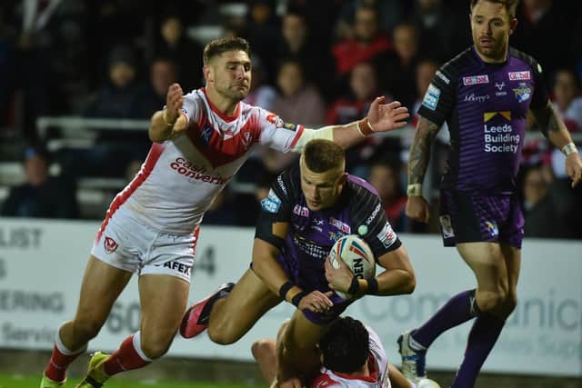 Ash Handley is pulled down. Picture by Steve Riding.