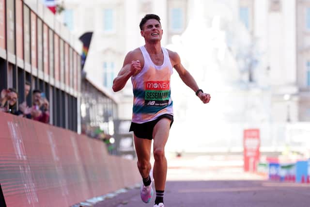 Phil Sesemann crosses the finish line at the London Marathon as the fastest British man