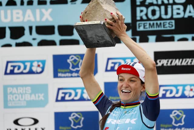 Otley's Lizzie Deignan lifts the Paris-Roubaix trophy. Picture: CorVos/SWpix.com.