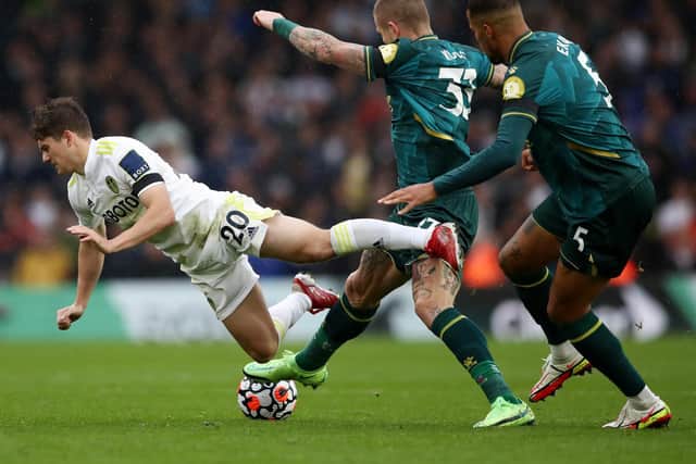 HANDFUL: Leeds United winger Dan James, left, caused Watford all sorts of bother in Saturday's clash at Elland Road, Juraj Kucka looking to tackle the Wales international, above. Photo by Jan Kruger/Getty Images.