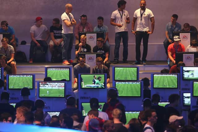 Gamers playing FIFA. Pic: Juergen Schwarz/Getty