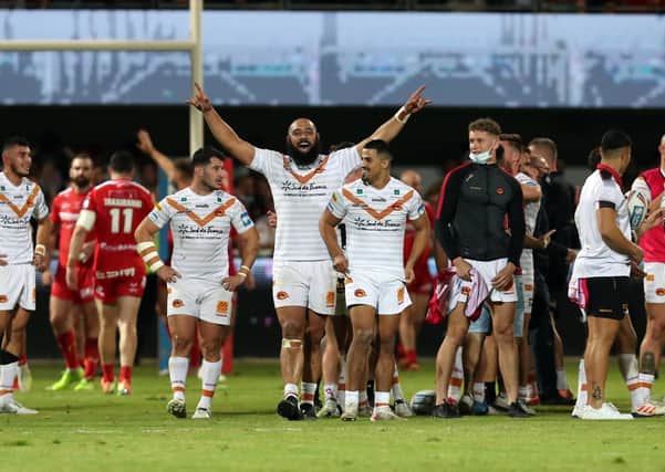 Sam Kasiano celebrates with his team-mates after Catalans Dragons defeated Hull KR to reach Saturday’s Super League Grand Final. Picture: Manuel Blondeau/SWpix.com.