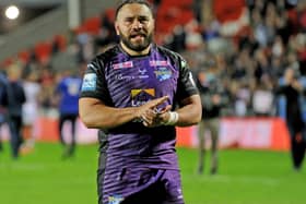 Fond farewell: Rhinos centre Konrad Hurrell says goodbye to the fans after the defeat at St Helens. Picture: Steve Riding.