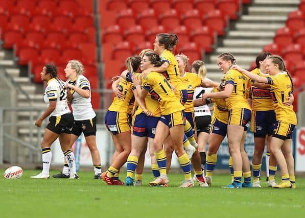 Rhinos celebrate as the final whistle sounds in their Women's Super League semi-final against York. Picture by Paul Currie/SWpix.com.