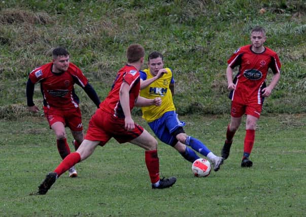 James  Crowther finds space for Stanningley Old Boys against Garforth Rangers. Picture: Steve Riding.