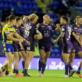 BEST PERFORMANCE: Leeds Rhinos' players celebrate their magnificent win at Warrington in July. Picture: Simon Hulme.