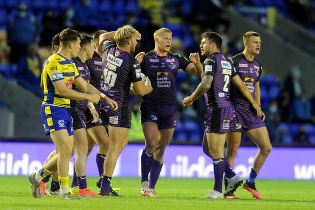 BEST PERFORMANCE: Leeds Rhinos' players celebrate their magnificent win at Warrington in July. Picture: Simon Hulme.