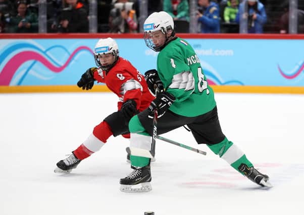 BRIGHT FUTURE: Mack Stewart of Team Red battles with Nathan Nicoud of Team Green during their Men's Mixed Ice Hockey NOC 3-on-3 Finals Gold Medal match at the Lausanne 2020 Winter Youth Olympics Picture: Linnea Rheborg/Getty Images