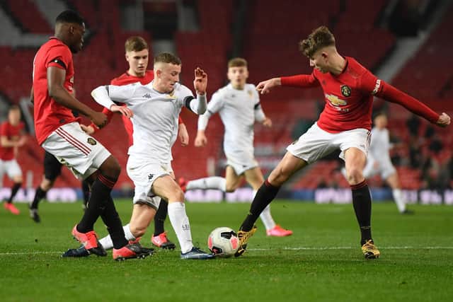 BREAKTHROUGH: For former Leeds United youngster Max McMillan, centre, at Fleetwood Town, pictured during the FA Youth Cup clash against Manchester United of February 2020 at Old Trafford. Photo by George Wood/Getty Images.