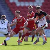 Sheffield Eagles' Josh Guzdek takes on Bradford Bulls' Aaron Murphy in the opening game of the 2021 Betfred Championship season. Next year, matches will be shown live by Premier Sports. (John Clifton/SWpix.com)