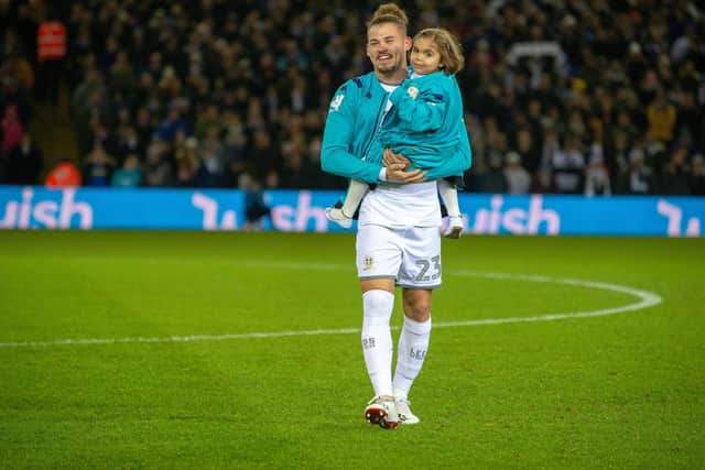 TRIBUTE: To Sarah Emmott, being held by Leeds United's England international midfielder Kalvin Phillips at the Championship clash at home to Preston North End of December 2019. Picture by Bruce Rollinson.