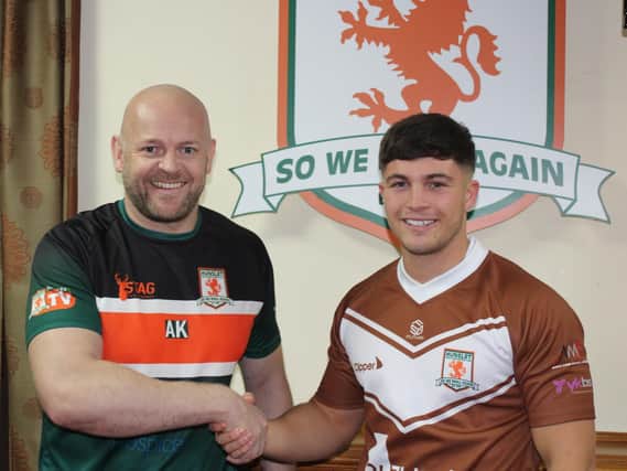 Dave Gibbons is congratulated by Hunslet coach Alan Kilshaw after signing a one-year contract. Picture c/o Hunslet RLFC.