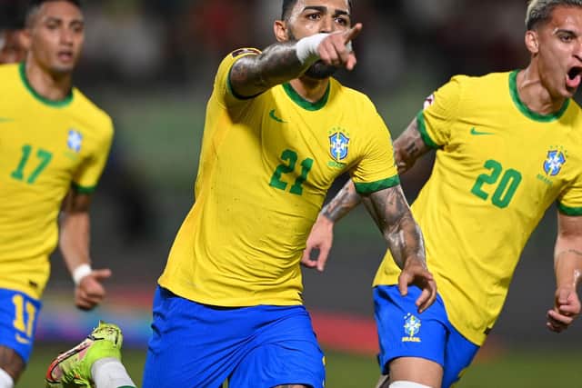 INSTANT IMPACT: Leeds United winger Raphinha, left, bagged two assists and proved pivotal as Brazil earned a penalty in a 3-1 victory against hosts Venezuela in the early hours of Friday morning. Photo by YURI CORTEZ/AFP via Getty Images.