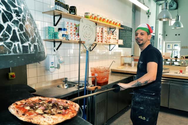 A hard-working staff member at Rudy's in Leeds. Picture: Jonathan Gawthorpe.