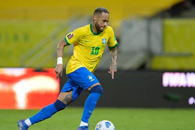 BACK AVAIABLE: Brazil star Neymar, above, returns from suspension for Sunday's World Cup qualifier in Colombia and could feature alongside Leeds United star Raphinha. Photo by Pedro Vilela/Getty Images.