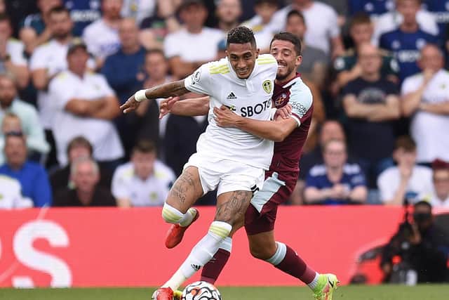 CLASS ACT: Leeds United winger Raphinha, now a Brazil international, is held back by West Ham's Pablo Fornals in last month's Premier League clash at Elland Road. Photo by OLI SCARFF/AFP via Getty Images.
