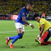 SKINNED: Leeds United winger Raphinha advances on another of his runs for Brazil in Sunday evening's goalless draw against Colombia in Barranquilla. Photo by JUAN BARRETO/AFP via Getty Images.