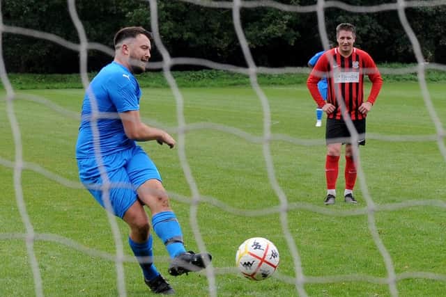 Alwoodley's Adam Turner scores from the penalty spot during Saturday's Yorkshire Amateur League Supreme division encounter with Lower Hopton. Picture: Steve Riding.