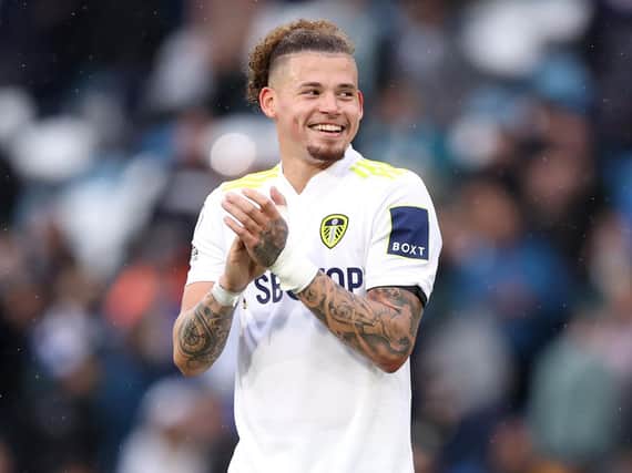 Leeds United midfielder Kalvin Phillips salutes the Elland Road crowd. Pic: Getty