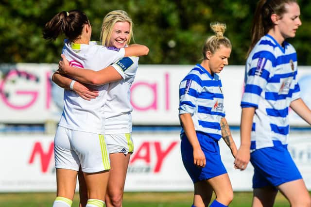 Laura Bartup celebrates a goal with Catherine Hamill. Pic: James Hardisty.