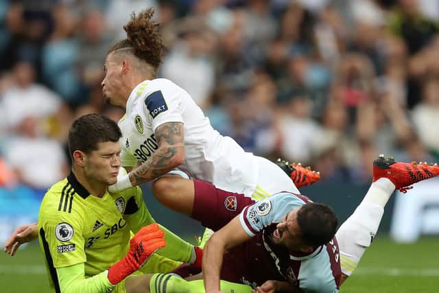 STAND-OUT PERFORMERS: Leeds United duo Illan Meslier, left, and Kalvin Phillips, top, collide with West Ham's Pablo Fornals, right, following Meslier's save in last month's clash at Elland Road. Photo by George Wood/Getty Images.