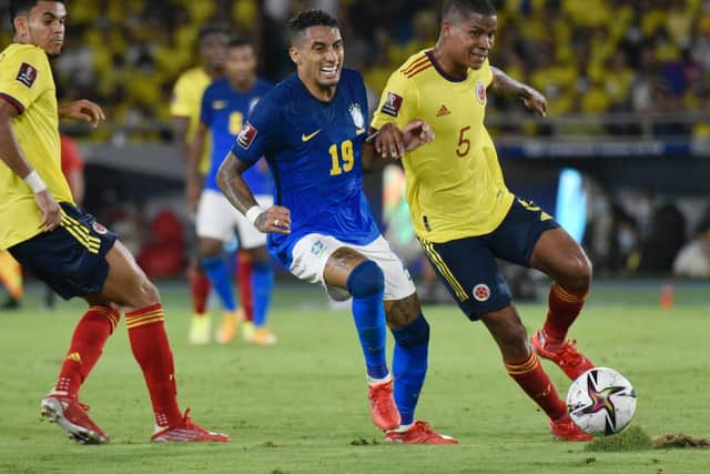 QUICKLY IMPRESSING: Leeds United winger Raphinha, centre, pictured in action for Brazil during Sunday's goalless draw against Colombia in Barranquilla. Photo by Guillermo Legaria/Getty Images.