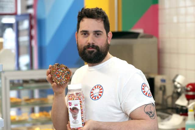 Bakery owner Rich Myers with the illegal sprinkles previously used on the best-selling cookies at Get Baked. Picture: Glen Minikin