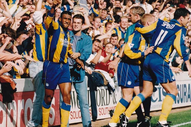 Striker Brian Deane celebrates after scoring Leeds United's opening goal in the 2-0 victory against Southampton at The Dell in September 1993. PIC: Mike Cowling