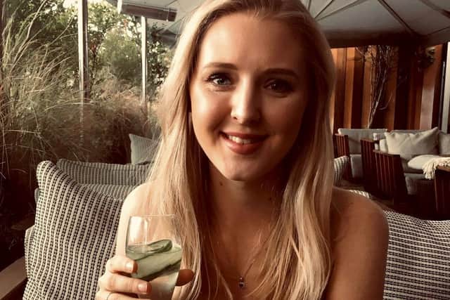 Emilie Boswell says she feels "trapped" in her flat after being hit with a huge £100,000 bill for cladding repairs. Picture: SWNS