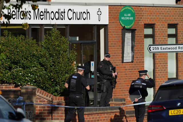Police outside the church where Sir David had been holding a constituency surgery.