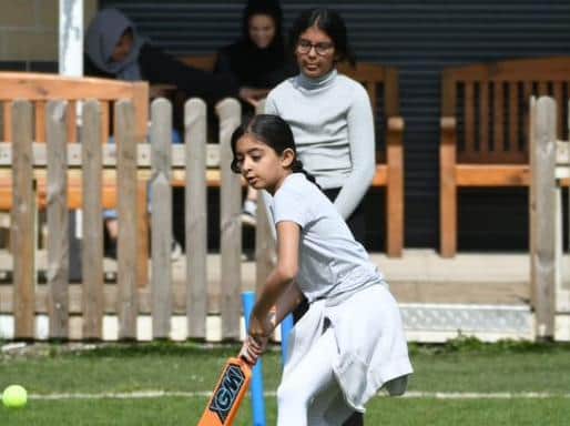 Two girls taking part in Crick-EAT.